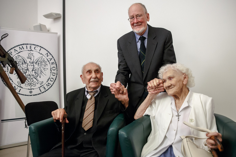Sam Bryan with the people photographed by his father 80 years before
