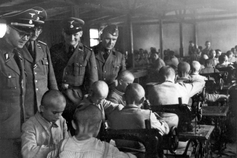 German officers inspecting camp sewing room (Archives of the Institute of National Remembrance, Łódź Branch).