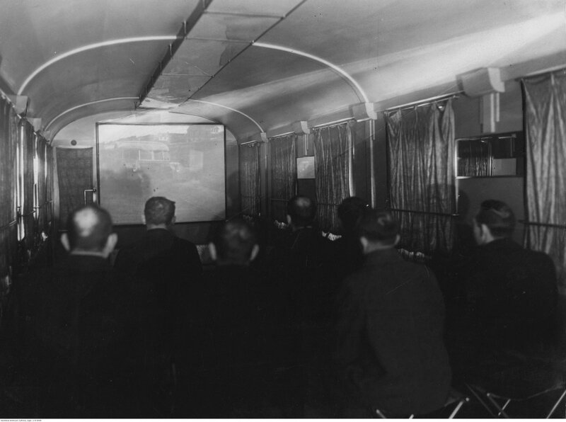 Passengers watching a film on the train, 1936