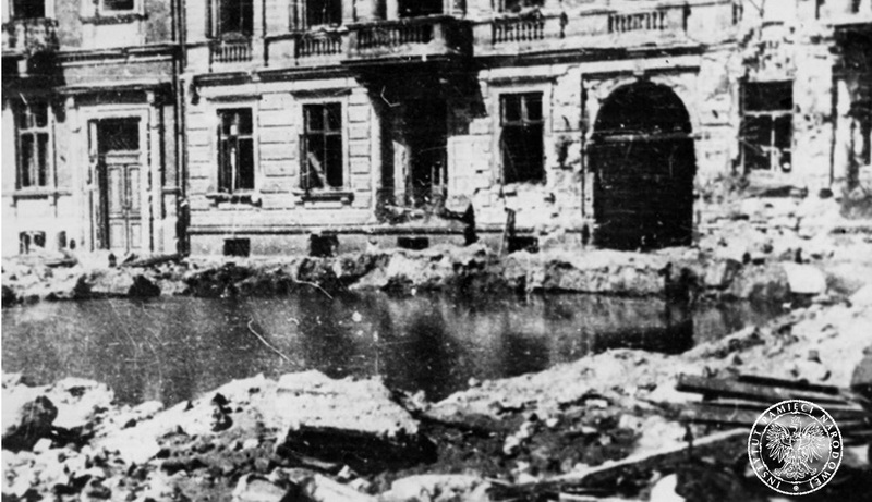 A crater filled with water, made by heavy artillery