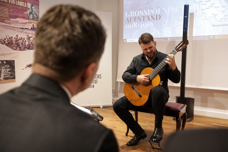 Łukasz Kuropaczewski performance at the opening of the IPN History Point in Berlin — 14 February 2023; photo: M. Bujak (IPN)
