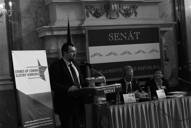 Dr. Bułhak giving a presentation on the activities of the Institute's Chief Commission for the Prosecution of Crimes against the Polish Nation.