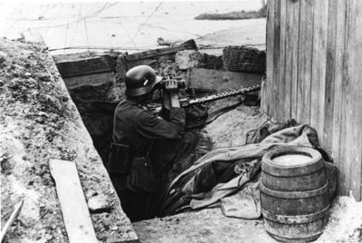 A Wehrmacht soldier in a improvised dugout, probably near Lviv, September Campaign 1939